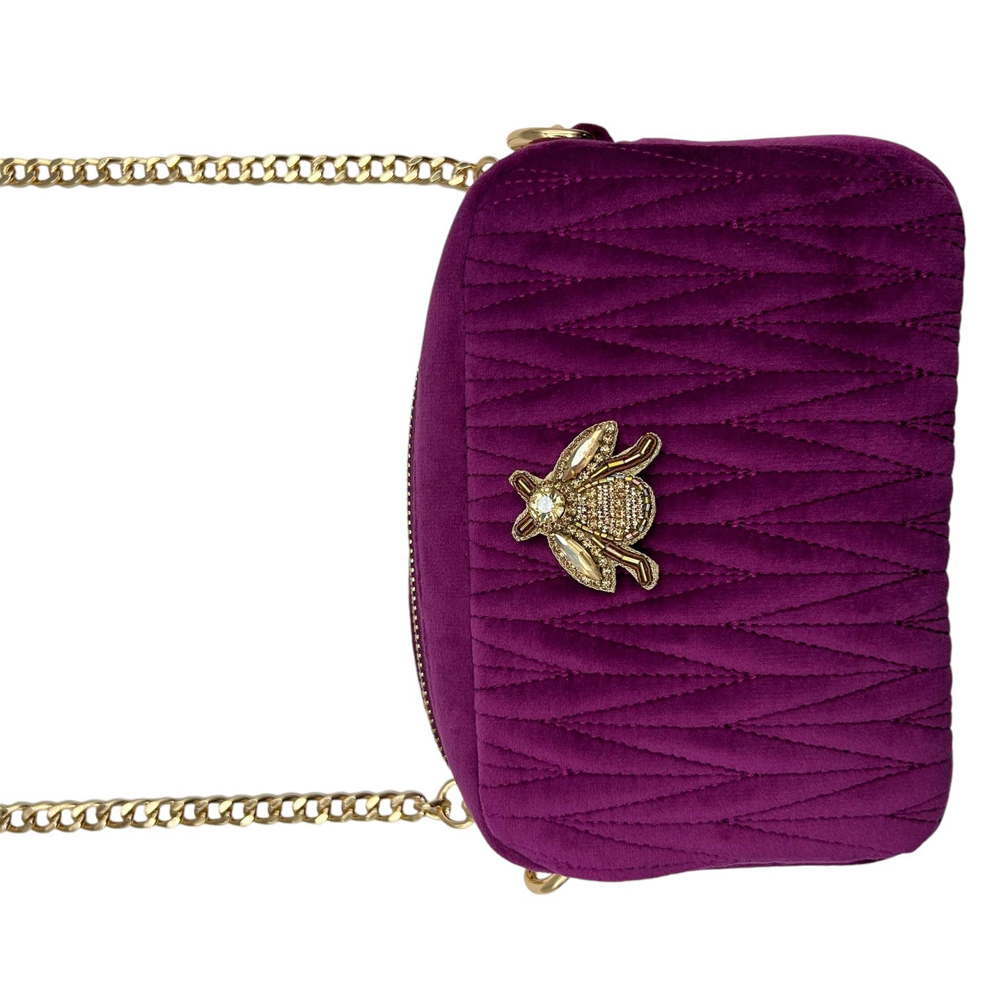 Velvet Rivington bag in fuchsia with gold insect brooch