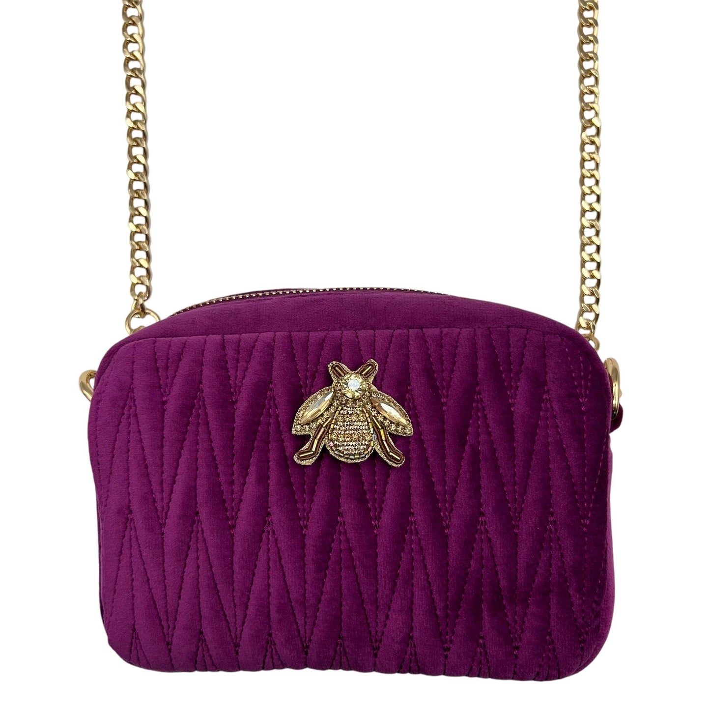 Velvet Rivington bag in fuchsia with gold insect brooch