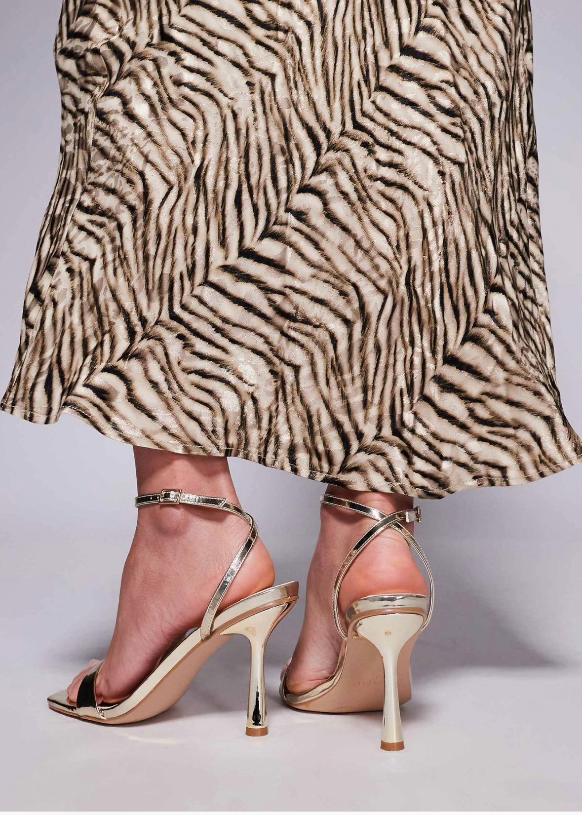 Barely there sandals in gold