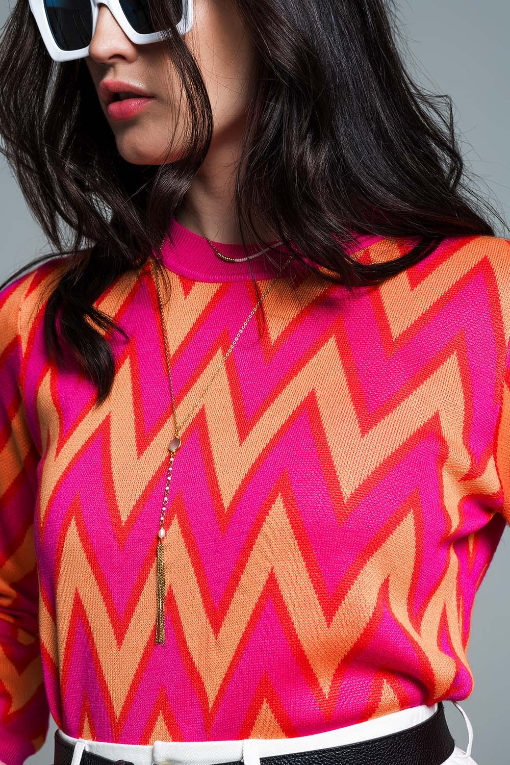 Pink and orange zigzag sweater
