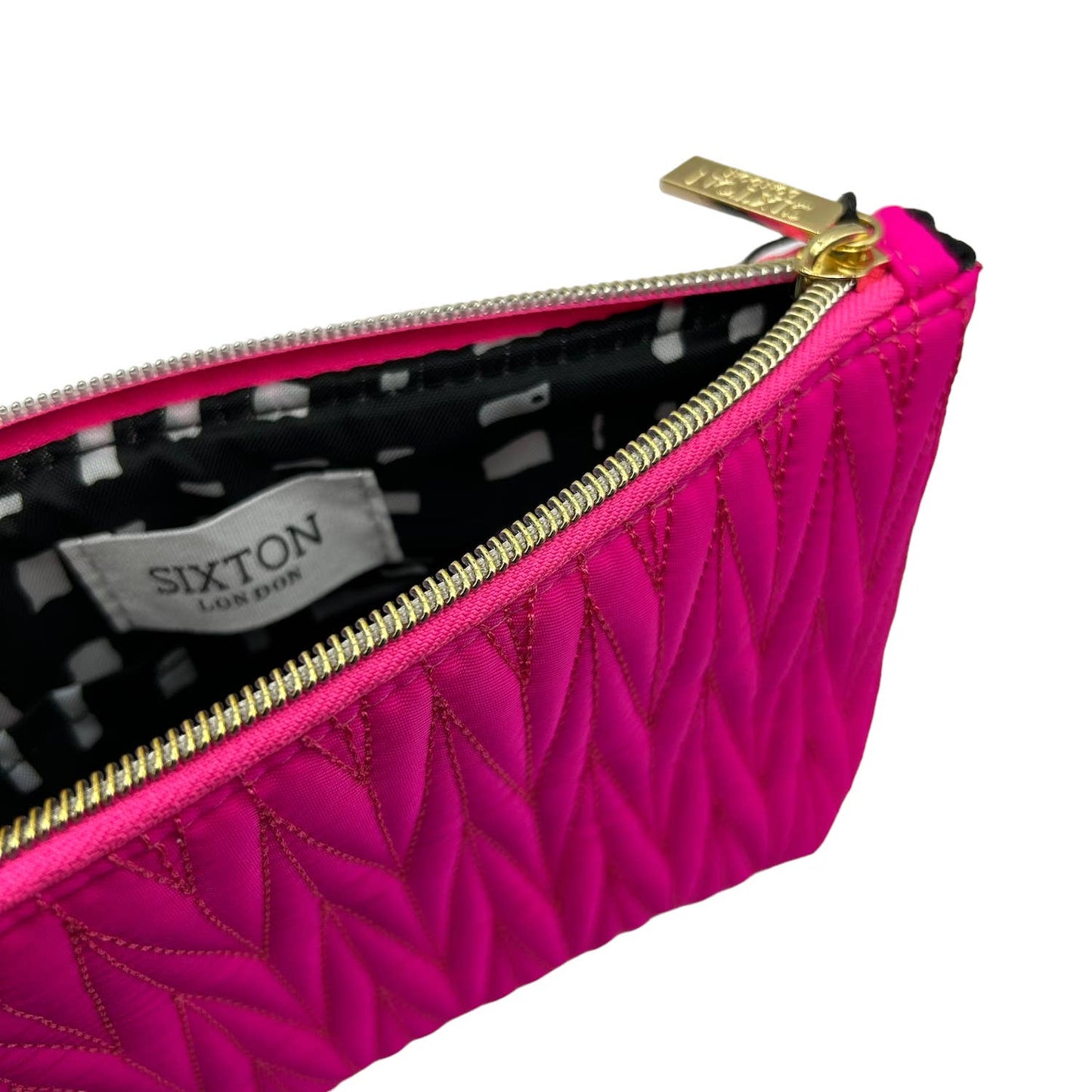 Bright Pink Tribeca makeup bag with Queen Bee pin