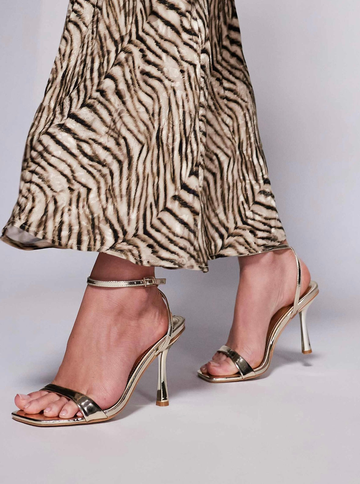 Barely there sandals in gold