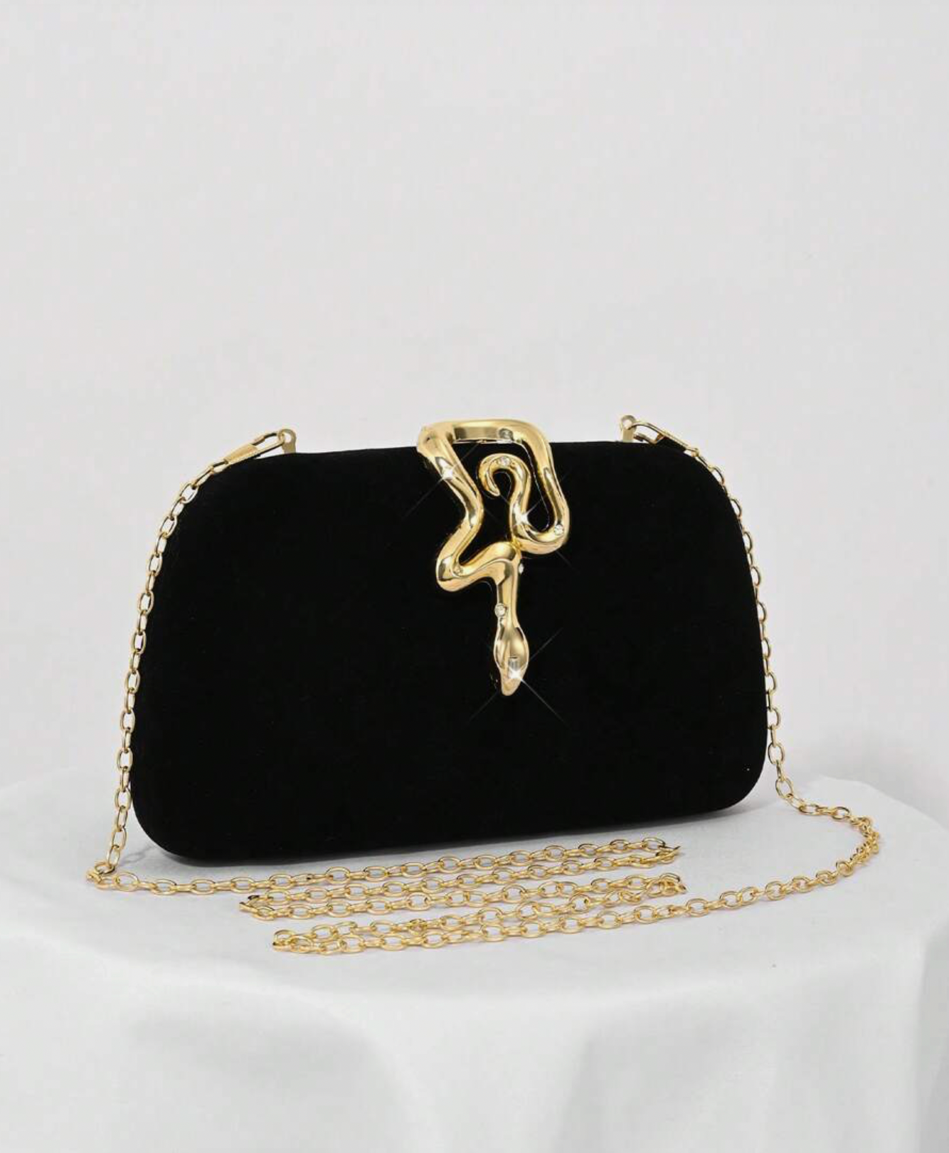 Suede Clutch Bag in Black and Gold