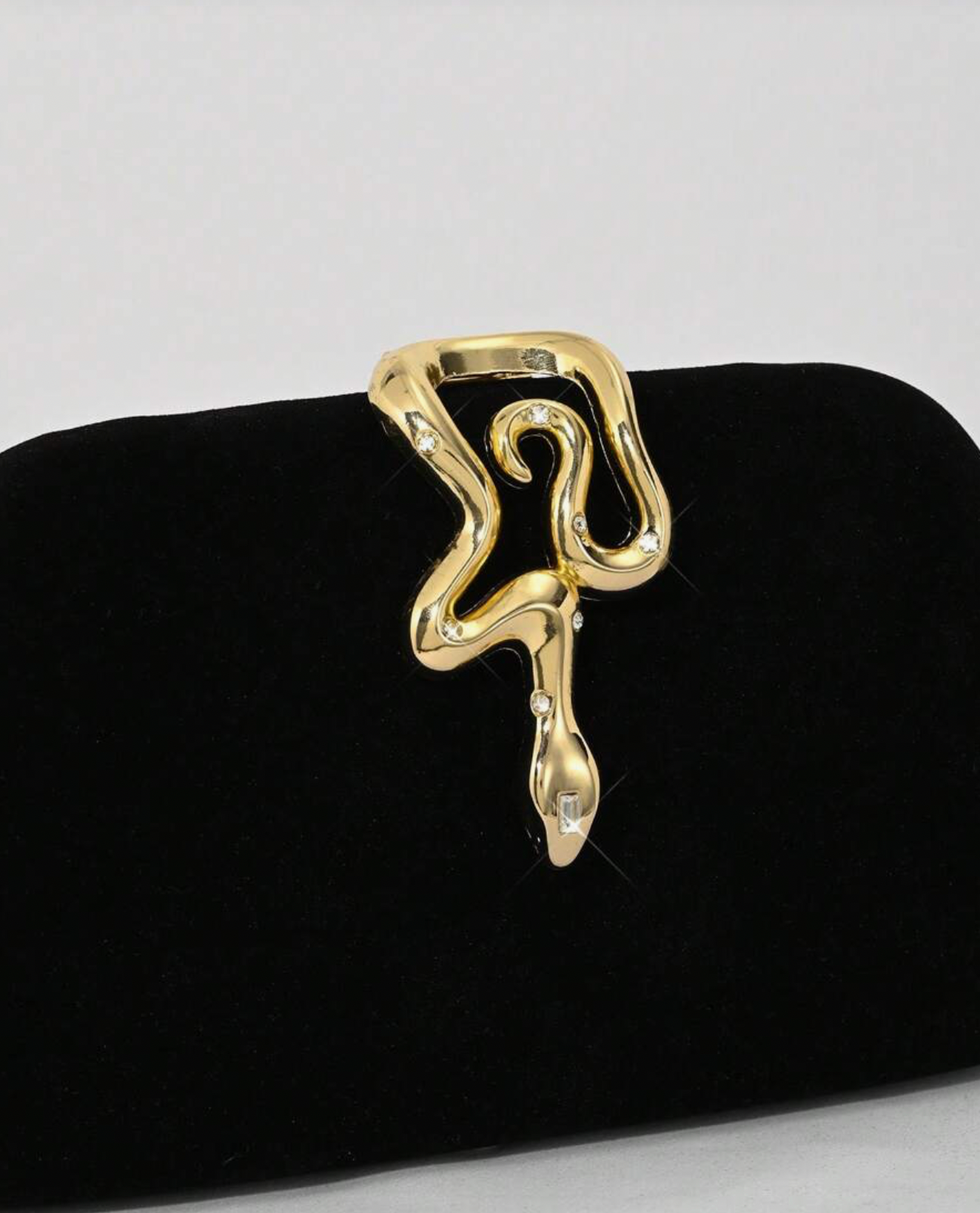 Suede Clutch Bag in Black and Gold