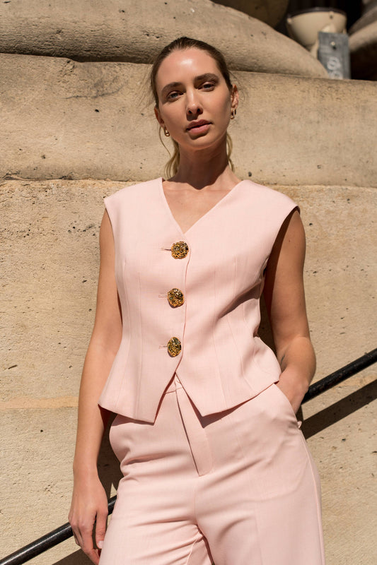 Sleeveless vest V-neck with gold buttons: Pink